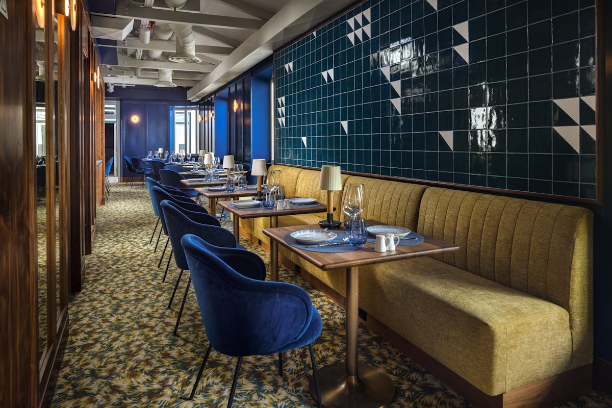 a chair sitting in front of a window